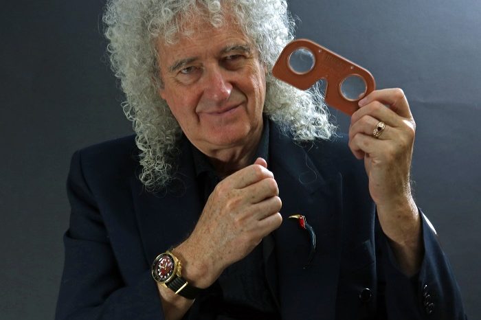 1.Denis Pellerin. 2022. Sir Brian May holding one of his Steampunk Owl viewers